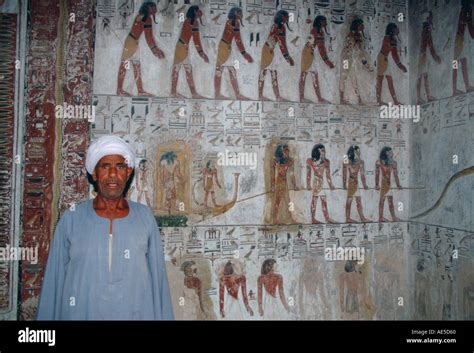Egyptian Man Standing Guard In King Setis Tomb In The Valley Of The