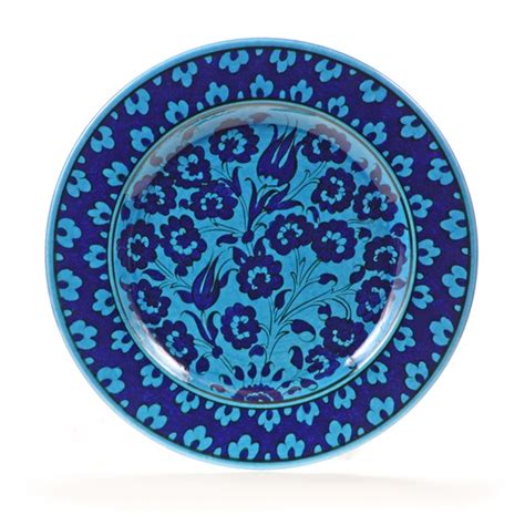 Very pretty lilac florals and cranberry trim with turquoise beaded design around the rim. 10" Turkish Turquoise "Masterwork" Decorative Plate