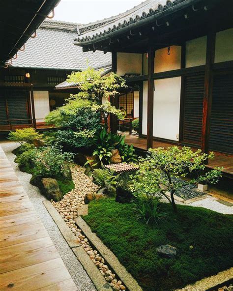 Japanese Courtyard With Greenery And Stone Homemydesign