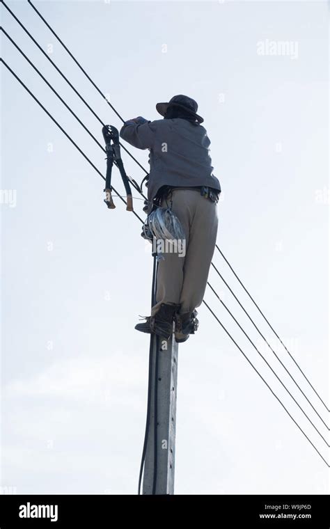 Electricty Power Lines Man Climbing Repair Man Repair Electrical