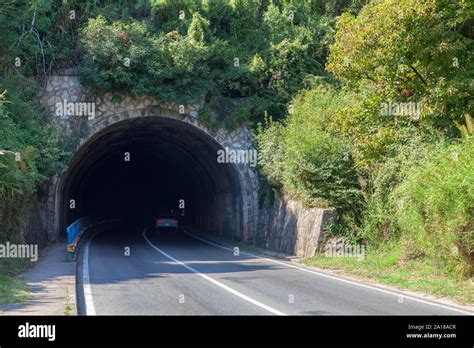 Highway With Tunnel Through The Mountains Stock Photo Alamy