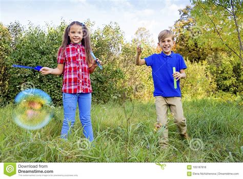 Kids Playing With Bubbles Stock Photo Image Of Spring 105187818
