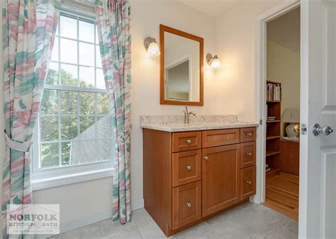 Contemporary bathroom with floating vanity | norfolk kitchen & bath. Bath Remodel With Cherry Vanity | Norfolk Kitchen & Bath