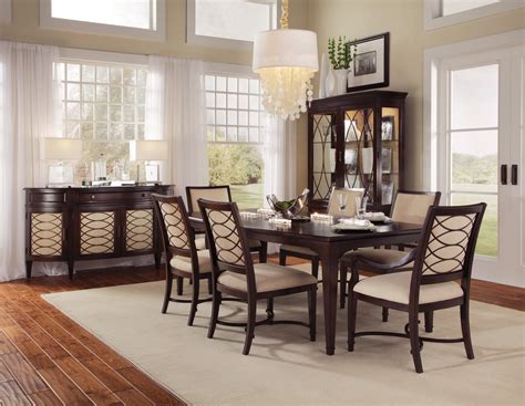 Mixing a dark wood (like ebony) with a light wood (like lime) will always look chic and intentional. if you're starting with a wood floor and are adding if you open a design textbook, you'll find the dining table and chairs in the same wood tone. Intrigue Transitional Contemporary Dark Wood Formal Dining ...