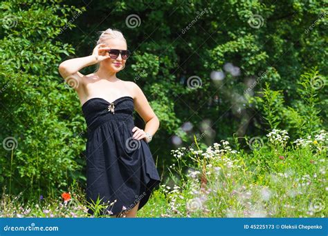 The Beautiful Blonde In A Black Dress Stock Image Image Of Blond