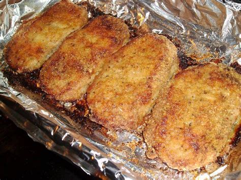 Rub pork chops with mustard mixture, and dredge 1 side of pork in panko mixture, pressing to adhere. Parmesan Baked Pork Chops - Best Cooking recipes In the world