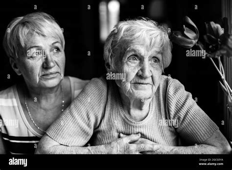 An Old Granny With Her Adult Daughter Black And White Photography