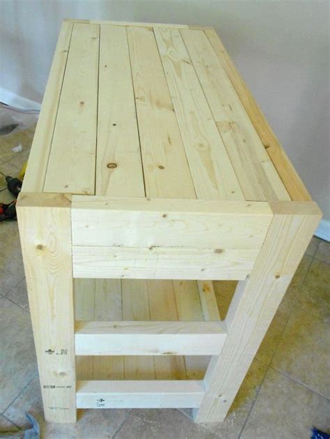 Mobile kitchen island (via freshhomeideas). $30 Kitchen Island Made With 2x4s | Wood diy, Diy kitchen ...