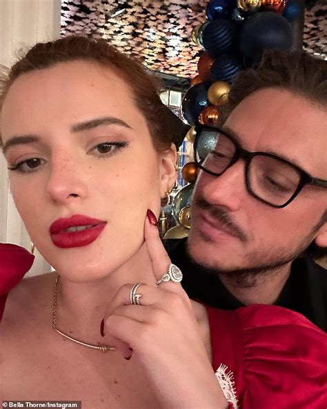 Bella Thorne Dons Red And White Dress While Celebrating Christmas With
