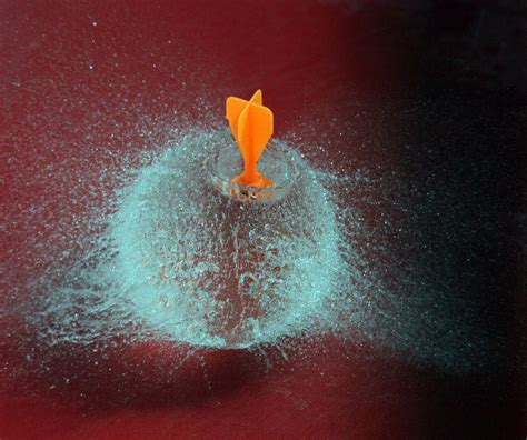 Popping A Water Balloon In Slow Motion High Speed Photography Water Balloons Balloons