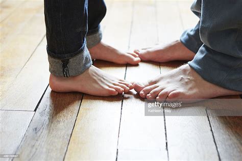 Father And Son Playing Games With Feet Photo Getty Images