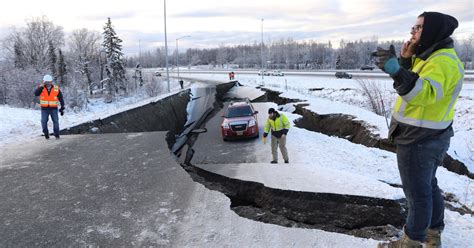 Surveying Store Damage Alaska Earthquake And Aftershocks Pictures