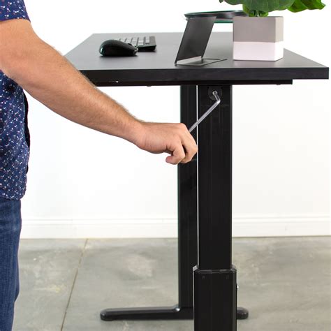 This has a rotatable lever for raising and lowering their worktops. NEW ADJUSTABLE MANUAL CRANK STAND UP DESK WORKSTATION DESK ...