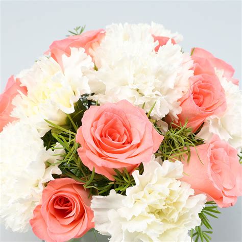 Buysend Pink Roses And White Carnations Vase Online Ferns N Petals