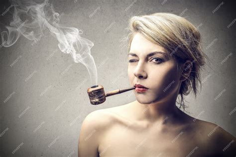 Premium Photo Blonde Woman Smoking A Pipe