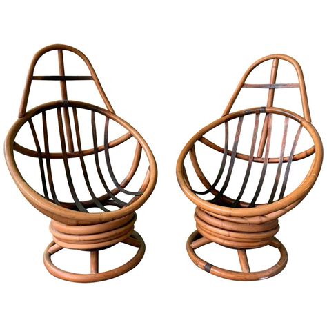 Pair Of Midcentury Rattan Rocking Swivel Lounge Chairs For Sale At 1stdibs