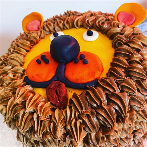 Today is the three year anniversary of our first cupcake tasting for our wedding. Lion Cake - Angel Food Bakery
