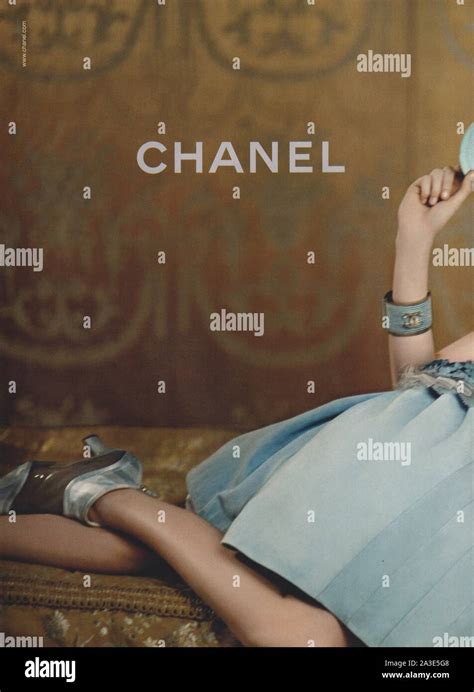 Poster Advertising CHANEL With Cara Delevingne In Paper Magazine From