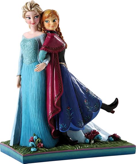 Amazon Com Jim Shore For Enesco Frozen Figurines By Jim Shore Anna And Elsa Enesco Home