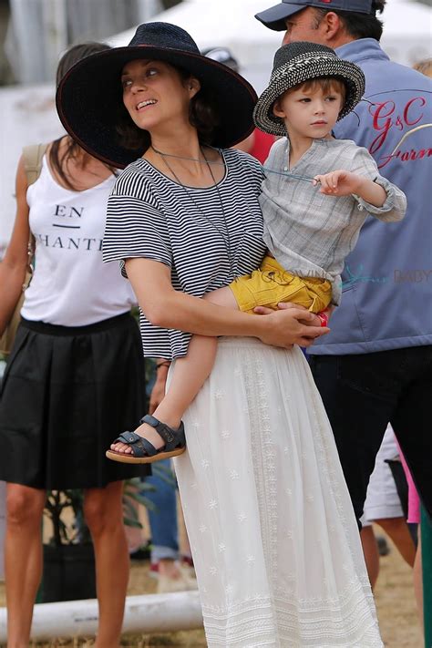 Marion Cotillard And Her Son Marcel Cheer For Her Husband Marcel Canet During Longines Global