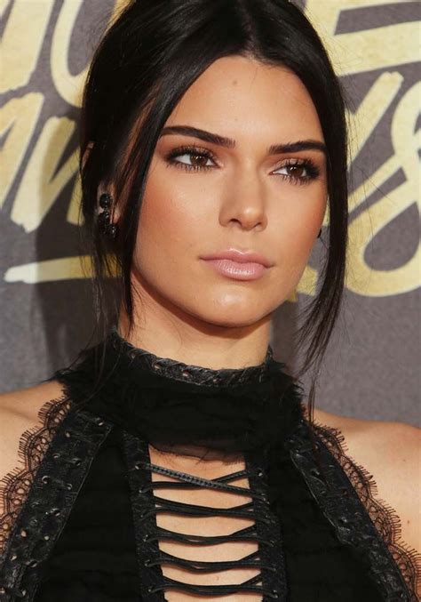 Kendall Jenner Tries To Tame Her Dsquared2 Riri Sandals At The 2016