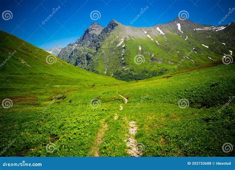 Beautiful Mountain Landscape Wiyh Green Grass At Caucasus Mountains