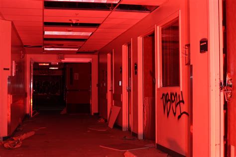 Red light down the hall fo an abandoned Northern California hospital