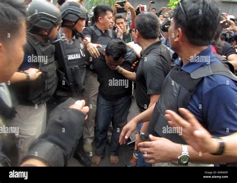 Jakarta Jakarta Indonesia 1st Jan 2010 Police Officers Caught And Arrested Two Of The