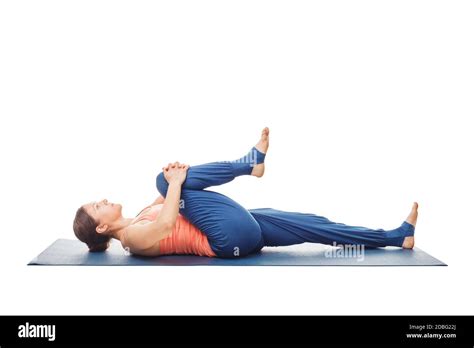Knee To Chest Pose Cut Out Stock Images And Pictures Alamy