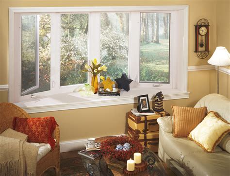 A trio of windows bumps out from this living room, forming a bay and welcoming a satisfying helping of sunshine. Decorating Ideas to Window Treatments for Casement Windows ...