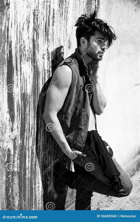 Handsome Man Model Dressed Punk Hipster Posing Dramatic In Grun Stock