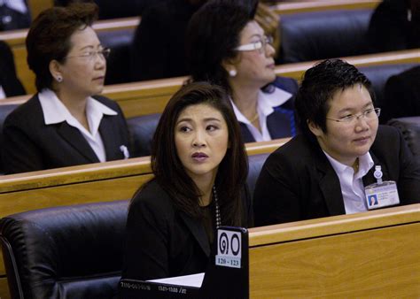 yingluck shinawatra is voted in as thailand s first female prime minister