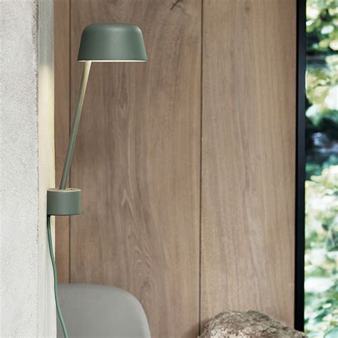 The lamp has a slender design that leans. Muuto Lean lamp-black in 2020 | Scandinavian lamps ...