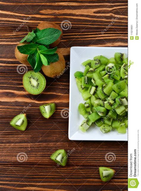 Freshly Sliced Kiwi Fruit With Whole Kiwis Stock Image Image Of