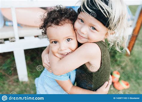 Two Happy Little Boys Hug Each Other Stock Photo Image Of African