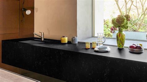Even when your quartz is clean and has no stains, it can be less than perfect. Black Corian Countertops - BSTCountertops