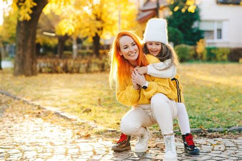 Mom And Girl Laughing Outdoors Autumn Fashion Stock Image Image Of