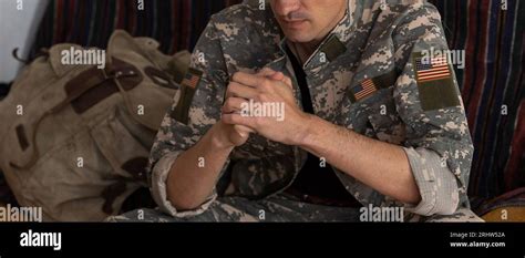 Soldier Man In Uniform Praying Stock Photo Alamy