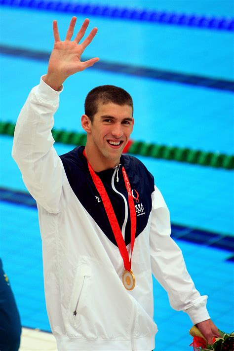 michael phelps with all his olympic medals