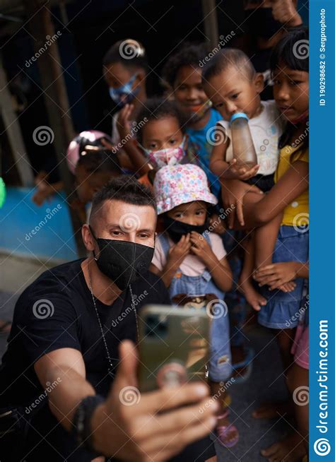 Photo Of A Small Village In Indonesia With Masked People