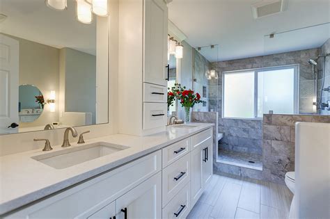 Get all of your bathroom supplies organized and stored with a new bathroom cabinet. Contemporary White Bathroom Cabinets | DeWils Custom Cabinetry