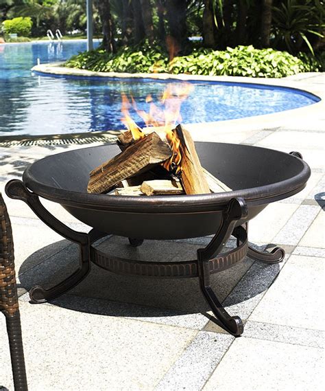 This process gives the fire pit bowl a look that is both classic and charming. Home page | zulily | Wood burning fire pit, Cast iron fire ...