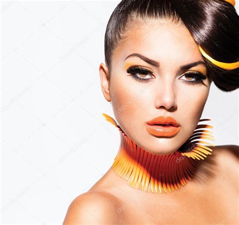 Fashion Model Girl Portrait With Yellow And Orange Makeup