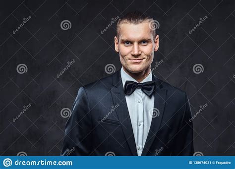 Portrait Of A Handsome Stylish Wearing Elegant Classical Suit With A