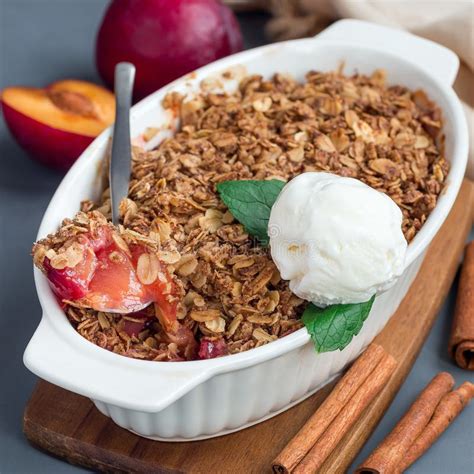 Plum Crumble Pie Or Plum Crisp With Oats And Spices Served With