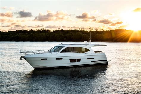 A cabin cruiser will feature at least one berth and will usually offer a head and a galley. Pleasure Cabin and Express Cruiser Boats | SureShade