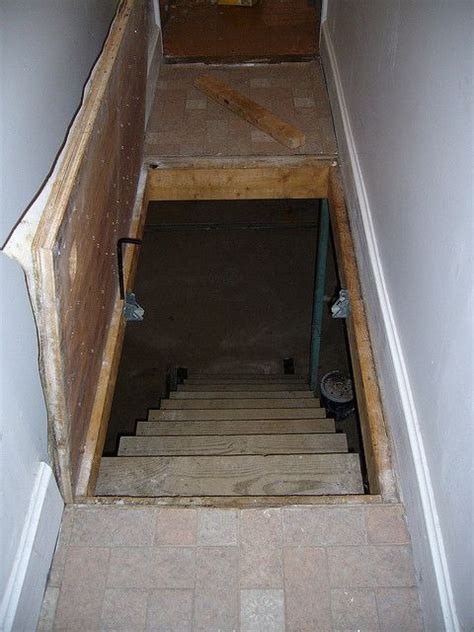 Hidden room under the stairs. Trap door to basement … | Pinteres…