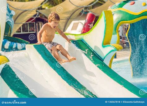 Boy Is Having Fun In The Water Park Stock Photo Image Of Child