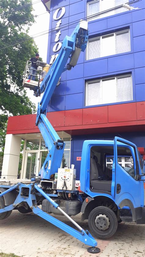 Hotel Signage Installation With A Truck Mounted Boom Lift