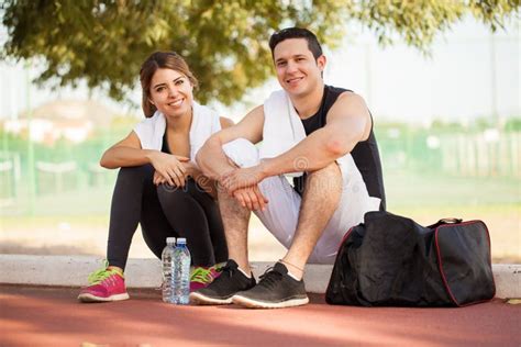 Happy Couple Relaxing After Exercising Stock Image Image Of Hispanic